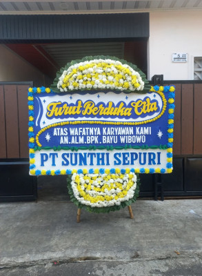 Papan Bunga Duka di Sumur