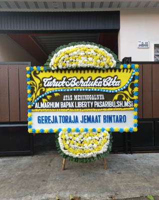 Papan Bunga Duka di Sumur
