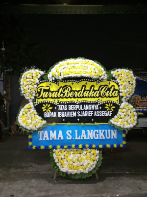 Papan Bunga Duka di Sumur