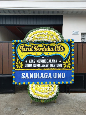 Papan Bunga Duka di Sumur