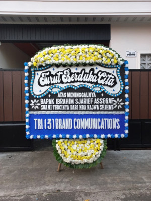 Papan Bunga Duka di Sumur